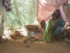 IDP family in Sortoni camp, outside UNAMID base (Nuba Reports)